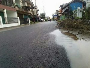 Pengaspalan Jalan Merapi dikerjakan Menjelang Detik Pergantian Tahun